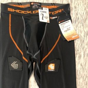Shock Doctor men’s size large hockey pants. With cup. NWT